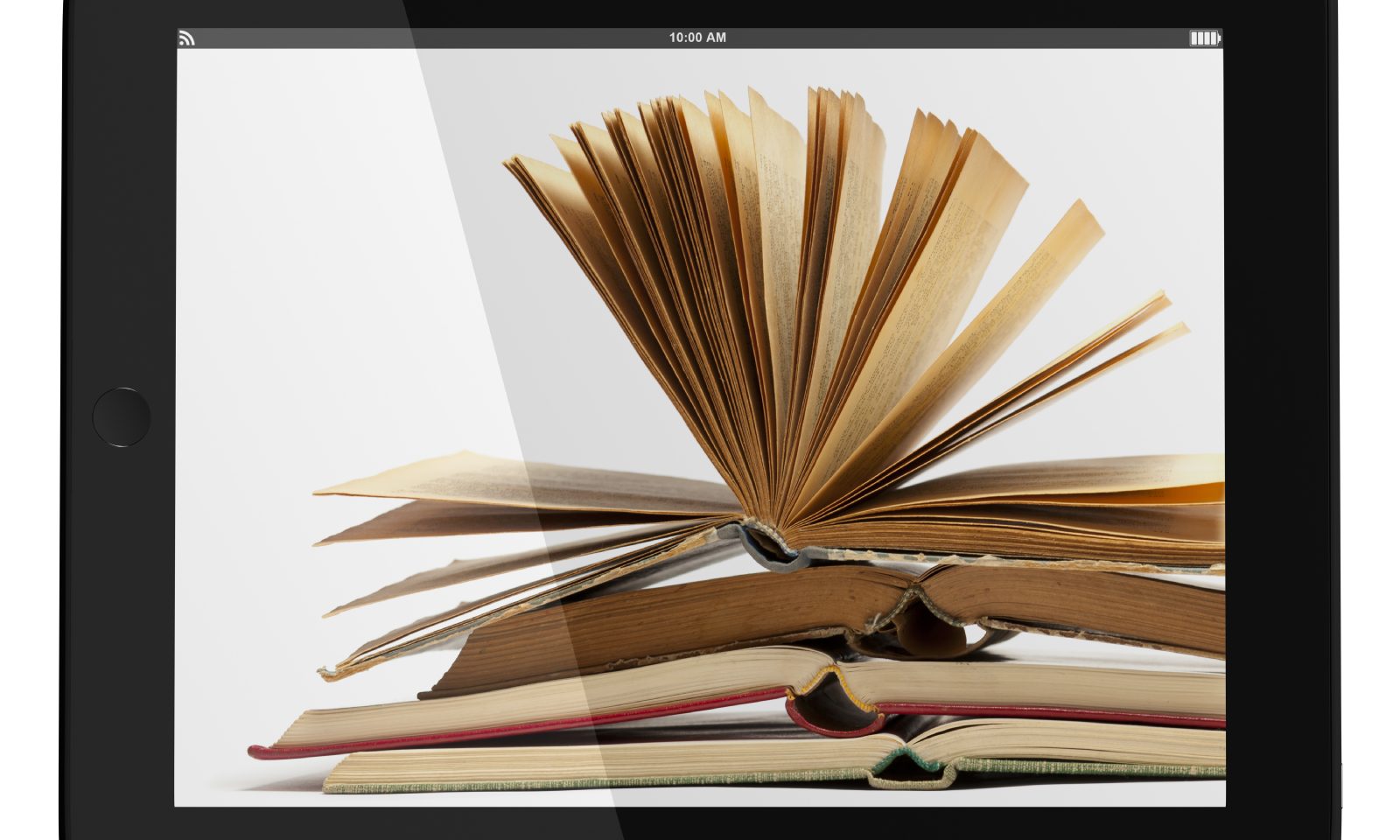 4 books stacked on top of each other, the top book is open, the pages are spreading out in an upward direction